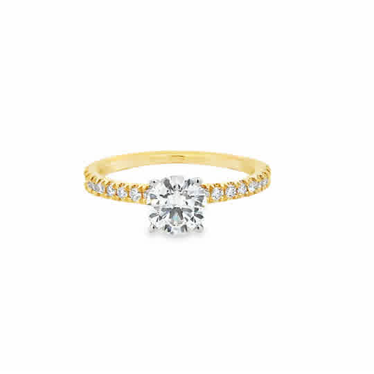 14 Karat Yellow Gold Engagement Ring with Round Cubic Zirconium, and .20ctw Round Brilliant Cut Diamonds