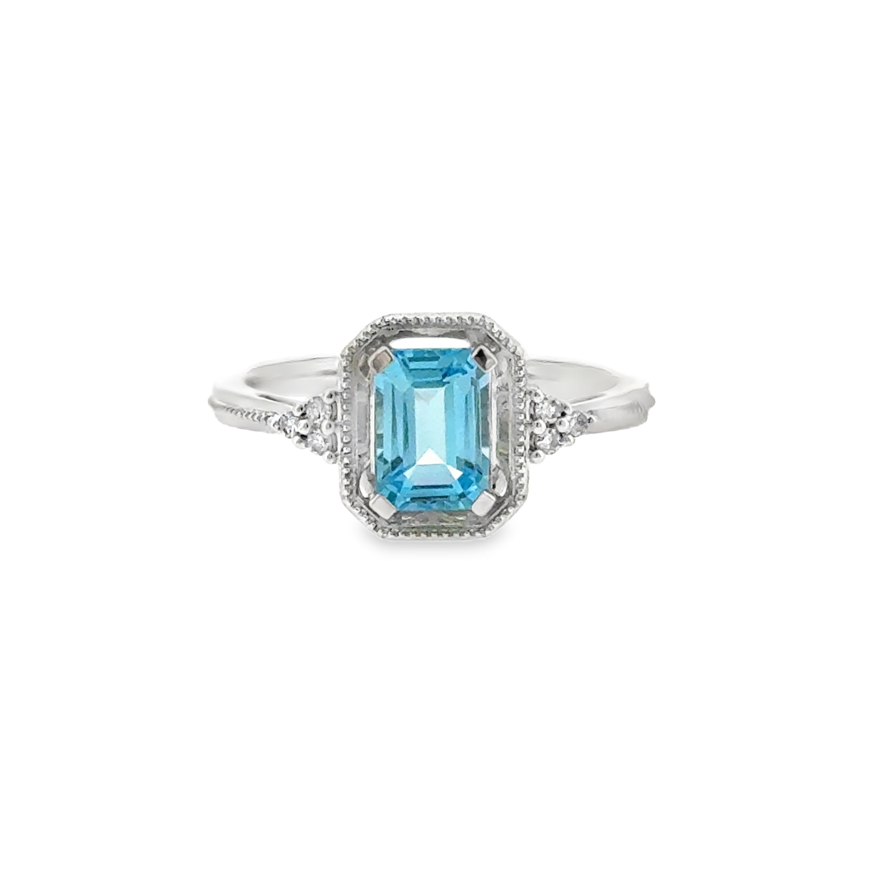Sterling Silver Vintage Style Fashion Ring with 1.14ctw Blue Topaz and .05ctw Round Diamonds