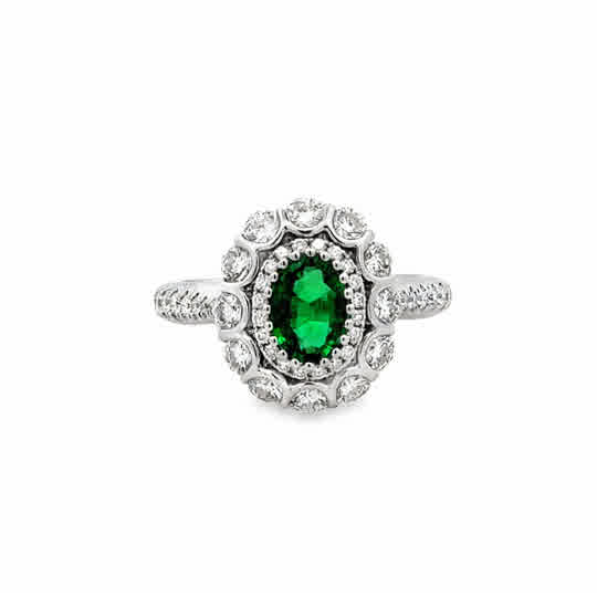 18 Karat White Gold Double Halo Fashion Ring with Oval Cut Emerald and Round Brilliant Cut Diamonds