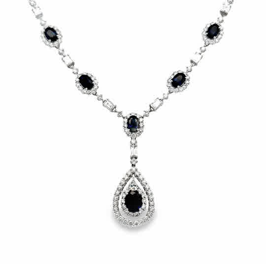 Lady's White 18 Karat Teardrop Dangle Necklace Length 17.5 one = 1.35c