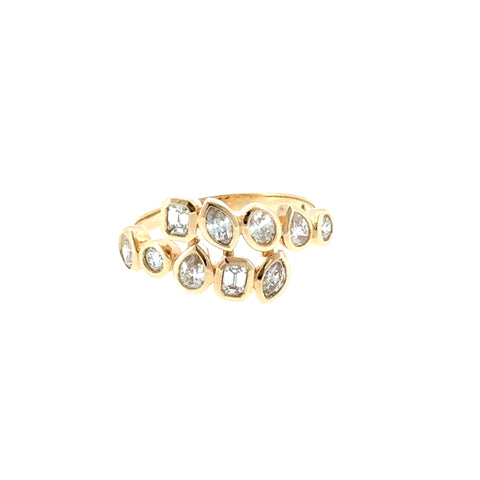 14 Karat Yellow Gold Bezel Set Crossover Fashion Ring with .85ctw Various Shape Diamonds