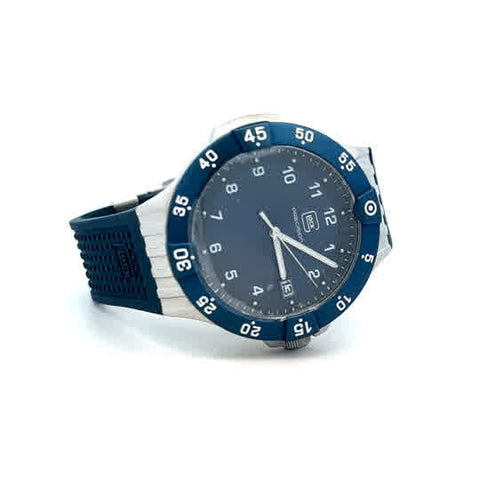 Housed in a sandblasted silver-toned stainless steel case, its deep bl